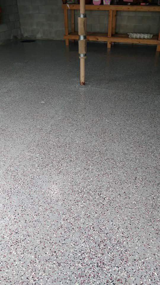 Polished concrete floor with speckled aggregate finish in residential space